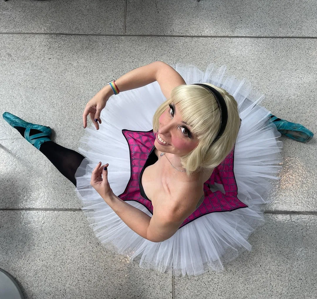 Jerikandra as Spider-Gwen in a ballerina version of the costume with a white tutu, photographed from directly above.